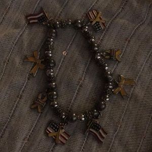 Heavy bracelet with charms